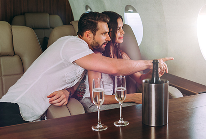 Rich man taking beautiful girl on his private plane